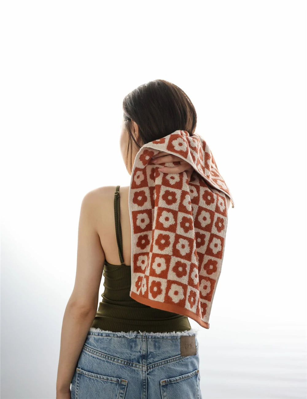 Orion Towel: Retro-inspired hand and bath towels with 70's floral print, soft cotton, various colorways. Shop now.