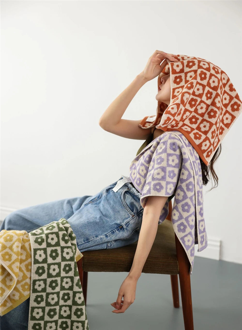 Orion Towel: Retro-inspired hand and bath towels with 70's floral print, soft cotton, various colorways. Shop now.