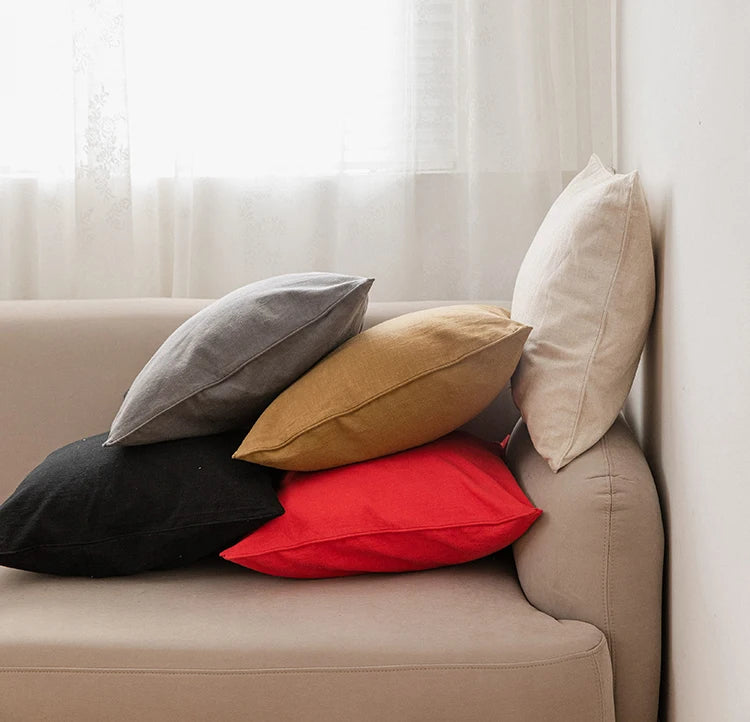 A stylish Daria Pillow Cover featuring a solid design in a cotton-linen blend. Available in two sizes, this square pillow cover comes in various neutral colorways, making it easy to mix and match with existing decor. The cover includes a convenient zip closure, perfect for a quick home update. Ideal for home décor enthusiasts looking to enhance their living space with a touch of elegance and comfort.