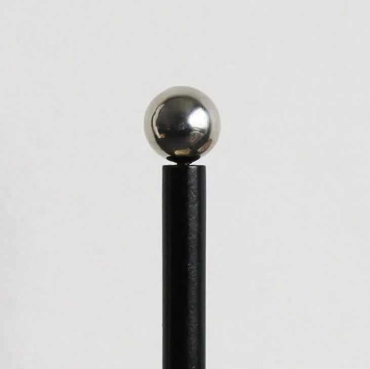 Modern acrylic paper towel holder with ball detail, available in three colorways.