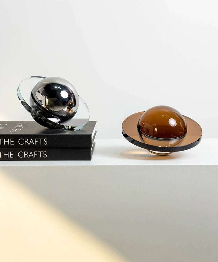 Modern crystal Flying Saucer Decorative Object in silver or brown finish. A captivating blend of contemporary design and cosmic inspiration, ideal for adding a unique touch to your space.