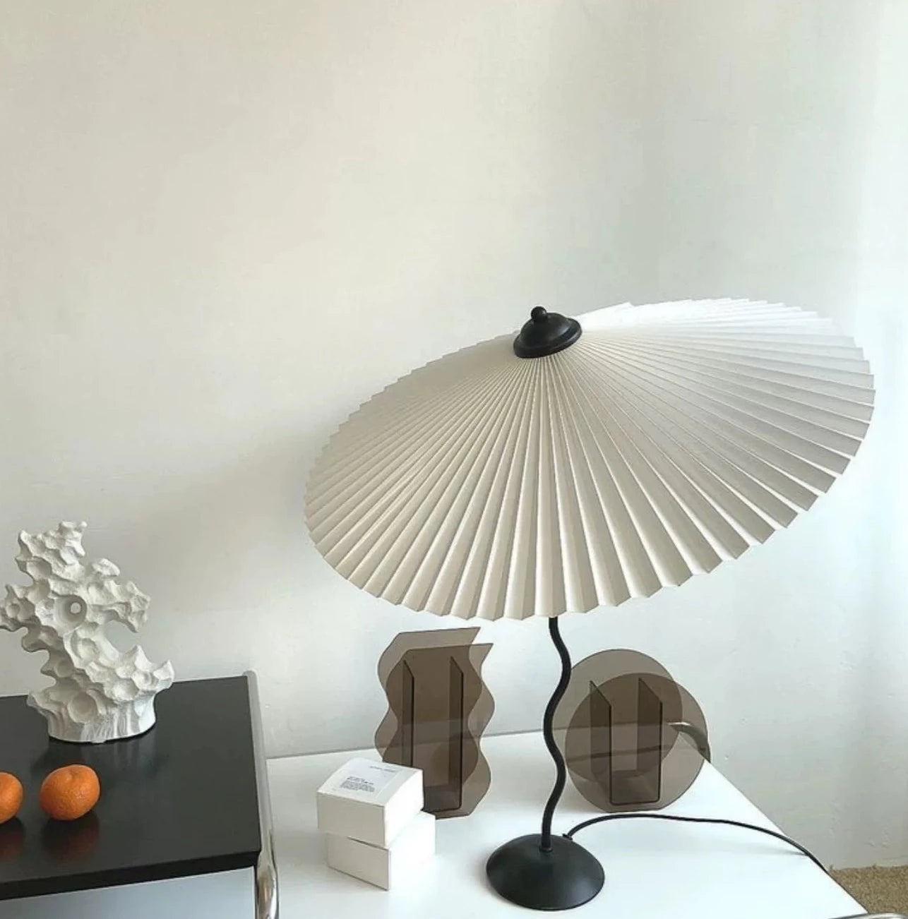 Iron base wavy table lamp with pleated shade, modern design, various colors, Domus Forge.