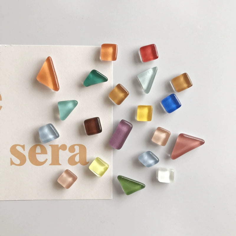 ulia Magnet Set - 20 glass magnets in various shapes and vibrant colors for fridge and office décor. Shop now at Domus Forge.
