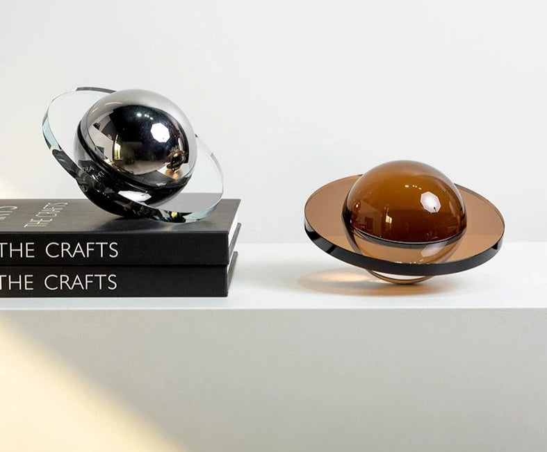 Modern crystal Flying Saucer Decorative Object in silver or brown finish. A captivating blend of contemporary design and cosmic inspiration, ideal for adding a unique touch to your space.