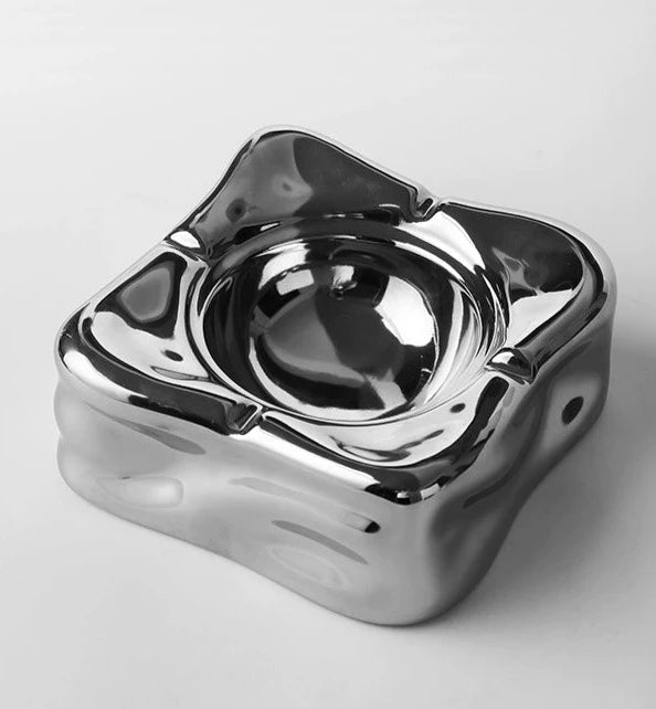 Foresta Ceramic Ashtray with cute ball detail, irregular shape, and modern design. Available in various colorways, choose between lidded or lidless options to suit your style. Crafted from high-quality ceramic for a sleek and contemporary smoking accessory.