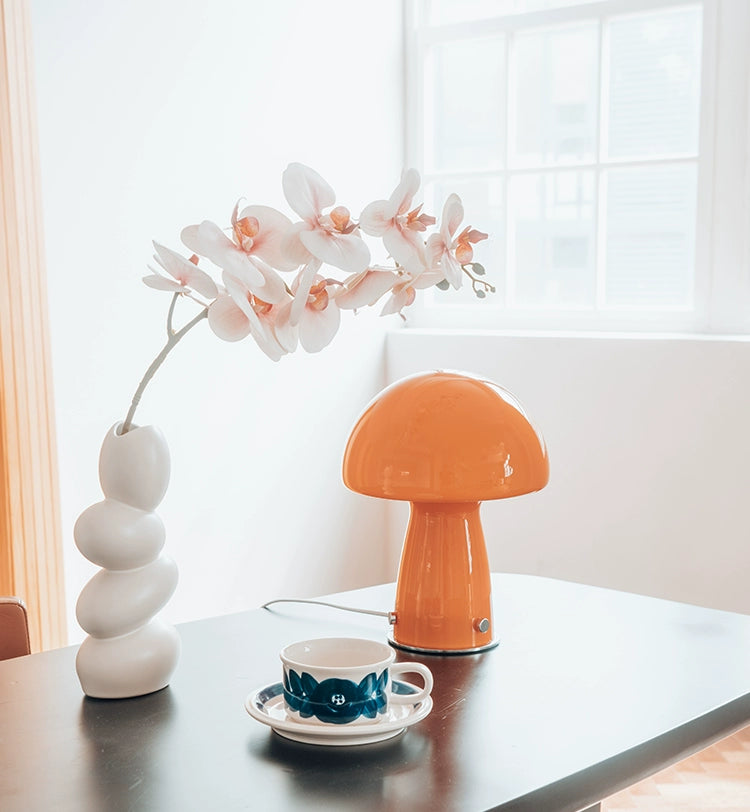 Callum Mushroom Table Lamp, glass, Bauhaus-inspired, small, orange or white, vintage feel, warm glow, stylish home decor.