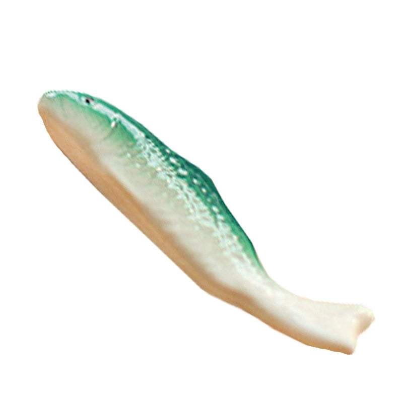 Zakka Chopstick Holder - Hand-painted porcelain fish in green and white ceramic. Perfect for hosting, intricate details, available as a single or pair. Small yet impactful dining accessory.