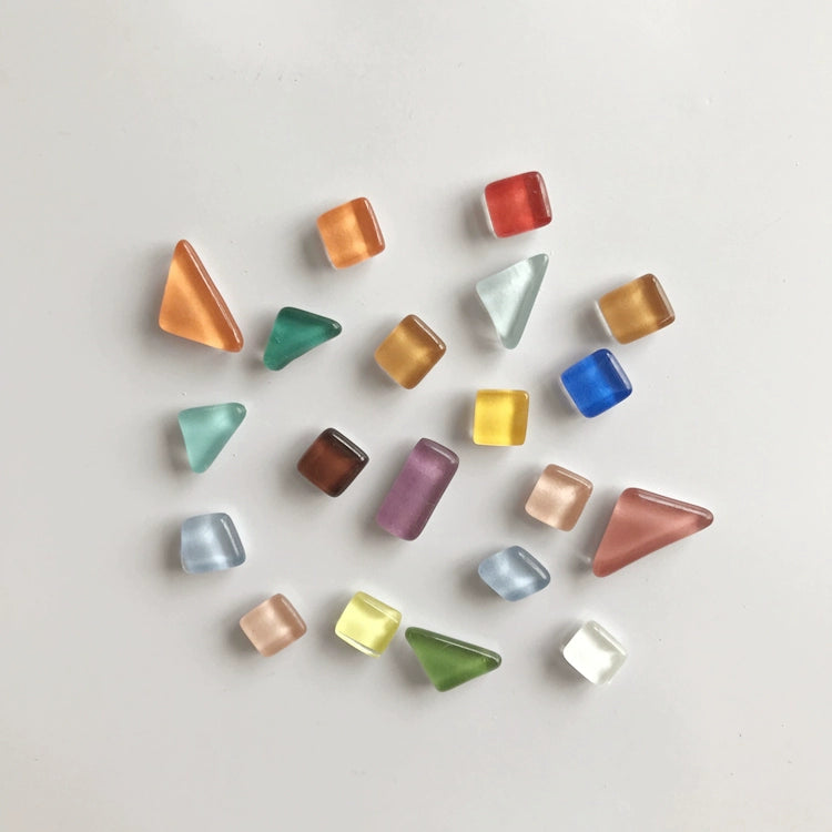 ulia Magnet Set - 20 glass magnets in various shapes and vibrant colors for fridge and office décor. Shop now at Domus Forge.
