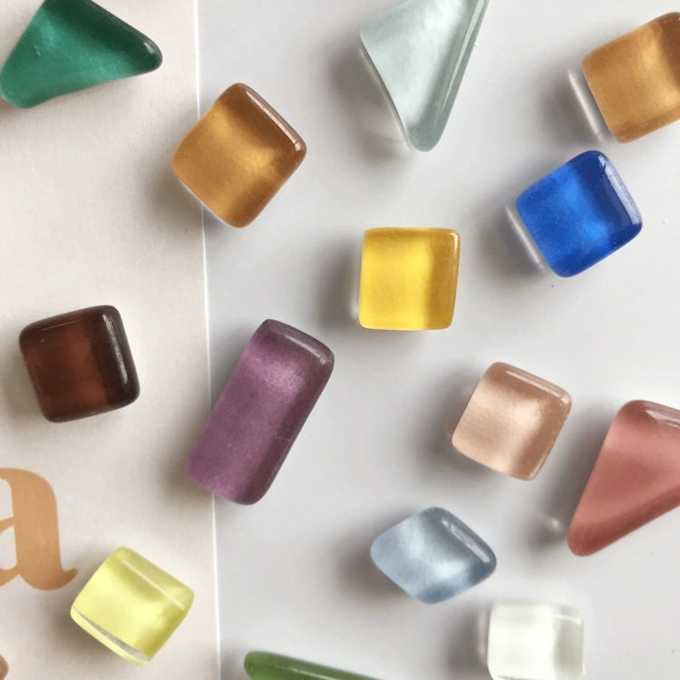 ulia Magnet Set - 20 glass magnets in various shapes and vibrant colors for fridge and office décor. Shop now at Domus Forge.