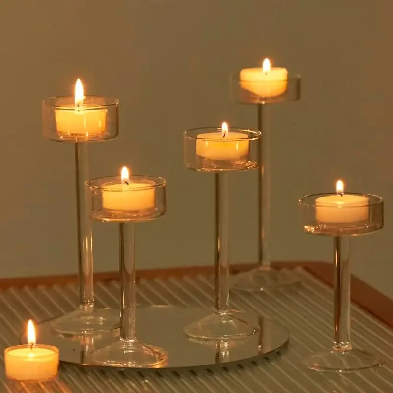 Kiu Candle Holder – set of three modern tea light holders in varying heights and colorways, perfect for creating a sleek, elegant centerpiece on tables, shelves, or mantels.