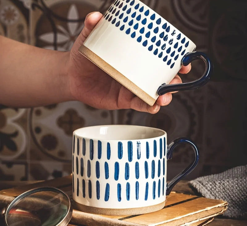 Vix Mug – 13oz cream ceramic mug with indigo-printed design, available in four unique styles, perfect for enjoying coffee, tea, or as a decorative piece.