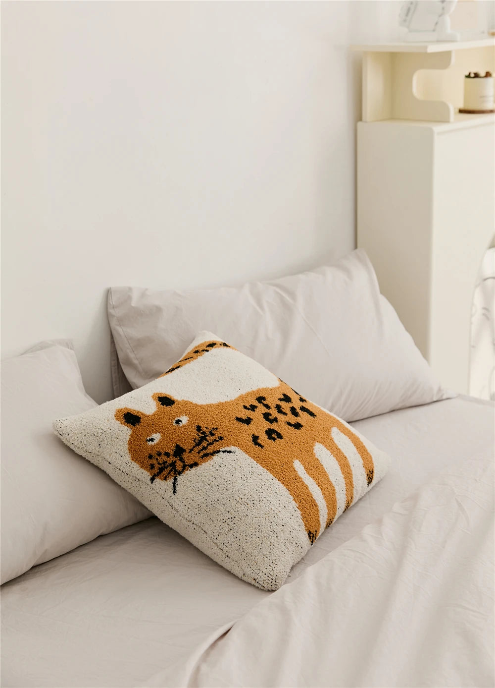 Square microfiber pillow cover with an orange-spotted cat design, adding charm and personality to home decor; 45 x 45 cm, insert not included. Ideal for creating a fun and stylish accent in any space, appealing to home decor enthusiasts.