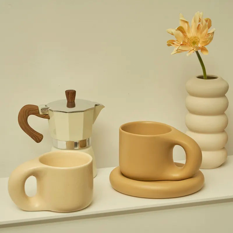 Tatum Mug and Saucer Set - Aesthetic rounded shape with two colorways, perfect for enhancing coffee or tea moments. Holds approximately 10 fluid ounces. Elevate your beverage experience with this chic and stylish duo from Domus Forge.