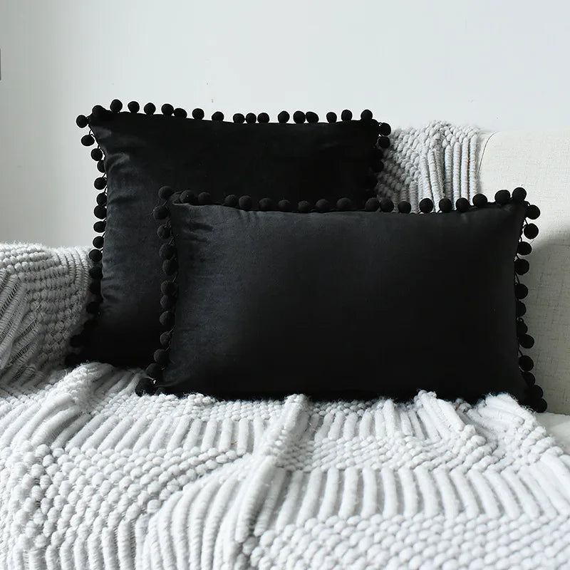 Yale Pillow Cover – luxurious velvet pillow cover with a small pom-pom border, available in multiple colors and sizes, adding a soft boho vibe to any room.
