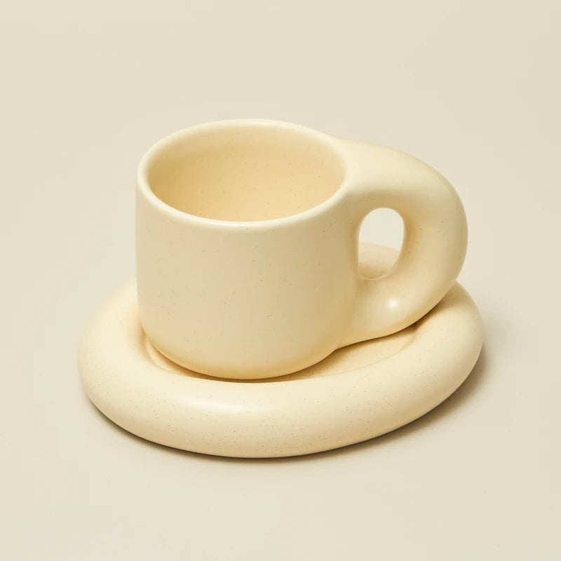 Tatum Mug and Saucer Set - Aesthetic rounded shape with two colorways, perfect for enhancing coffee or tea moments. Holds approximately 10 fluid ounces. Elevate your beverage experience with this chic and stylish duo from Domus Forge.