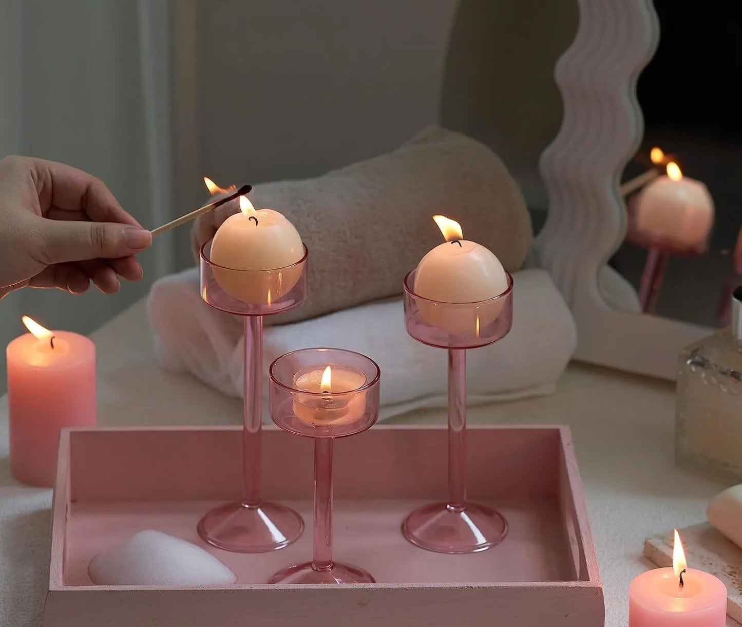 Kiu Candle Holder – set of three modern tea light holders in varying heights and colorways, perfect for creating a sleek, elegant centerpiece on tables, shelves, or mantels.