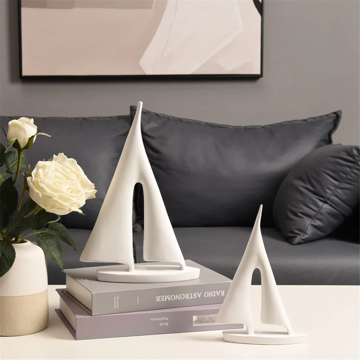 Zaz Sailboat Decorative Object – set of two white resin sailboats in small and large sizes, featuring a modern minimalist design, perfect for coastal-inspired décor.