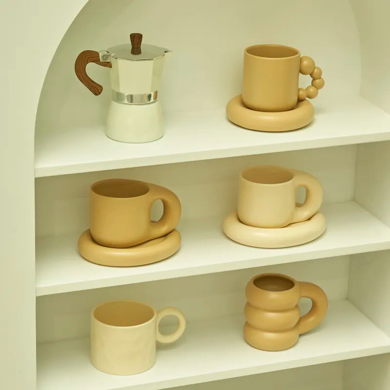 Tatum Mug and Saucer Set - Aesthetic rounded shape with two colorways, perfect for enhancing coffee or tea moments. Holds approximately 10 fluid ounces. Elevate your beverage experience with this chic and stylish duo from Domus Forge.