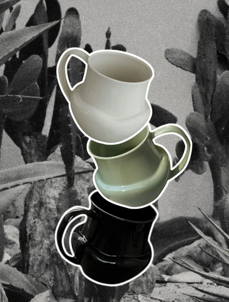 A large-capacity ceramic mug with a vintage look, available in white, green, and black. Perfect for enjoying coffee or tea, the Quig Mug combines timeless charm with functionality. Its durable ceramic construction and classic design make it ideal for home decor enthusiasts looking to add a stylish, nostalgic touch to their kitchen or workspace.