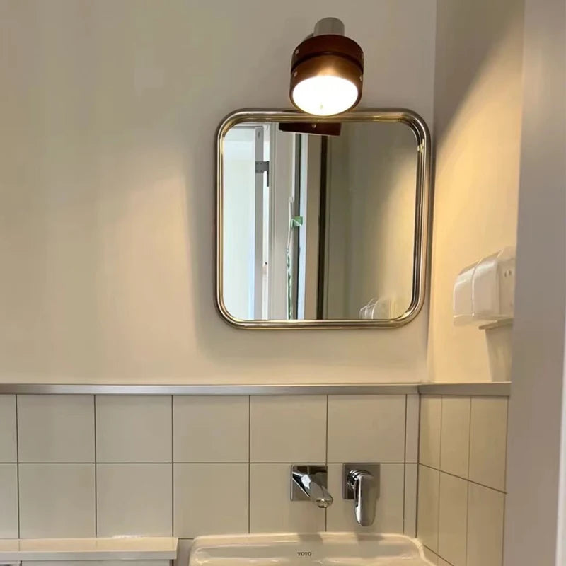 Uri Mirror – square mirror with rounded corners, vibrant colorways, and a retro-inspired design, available in small (60x60 cm) and large (80x80 cm) sizes.