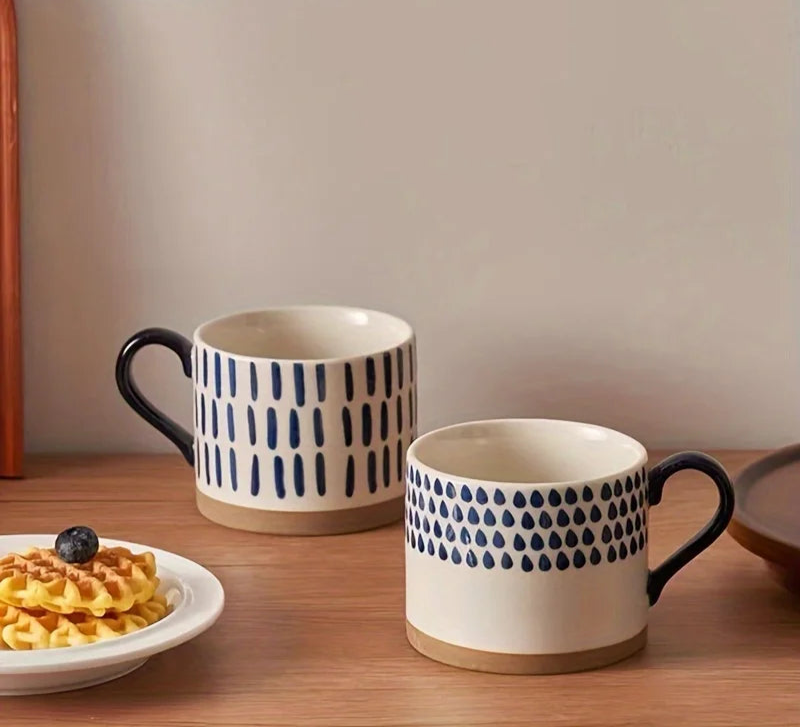 Vix Mug – 13oz cream ceramic mug with indigo-printed design, available in four unique styles, perfect for enjoying coffee, tea, or as a decorative piece.