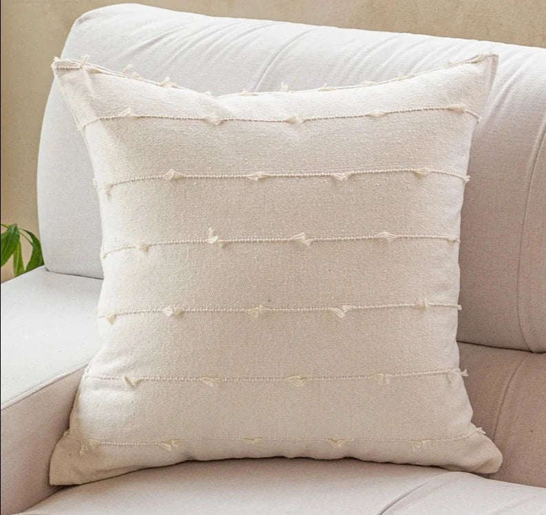 Elegant Irene Pillow Cover with cream neutral base and colored striped detailing, available in two sizes. Made from soft, high-quality cotton. Ideal for home decor enthusiasts, perfect for adding style to living rooms and bedrooms. Does not include filler.