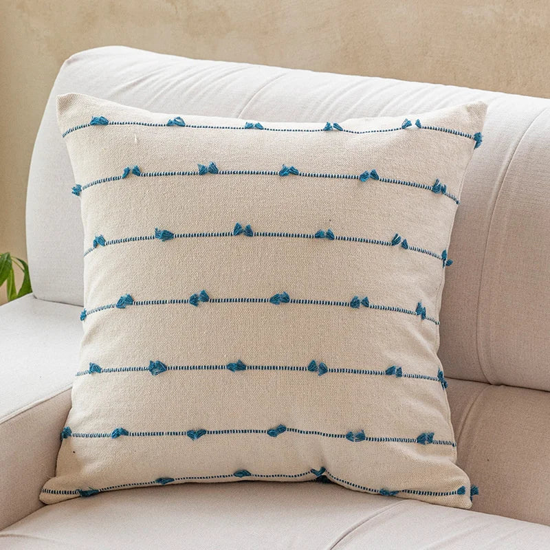Elegant Irene Pillow Cover with cream neutral base and colored striped detailing, available in two sizes. Made from soft, high-quality cotton. Ideal for home decor enthusiasts, perfect for adding style to living rooms and bedrooms. Does not include filler.