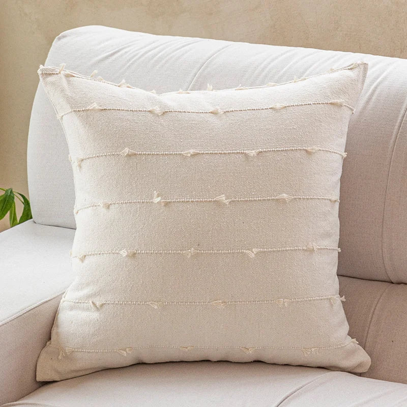 Elegant Irene Pillow Cover with cream neutral base and colored striped detailing, available in two sizes. Made from soft, high-quality cotton. Ideal for home decor enthusiasts, perfect for adding style to living rooms and bedrooms. Does not include filler.