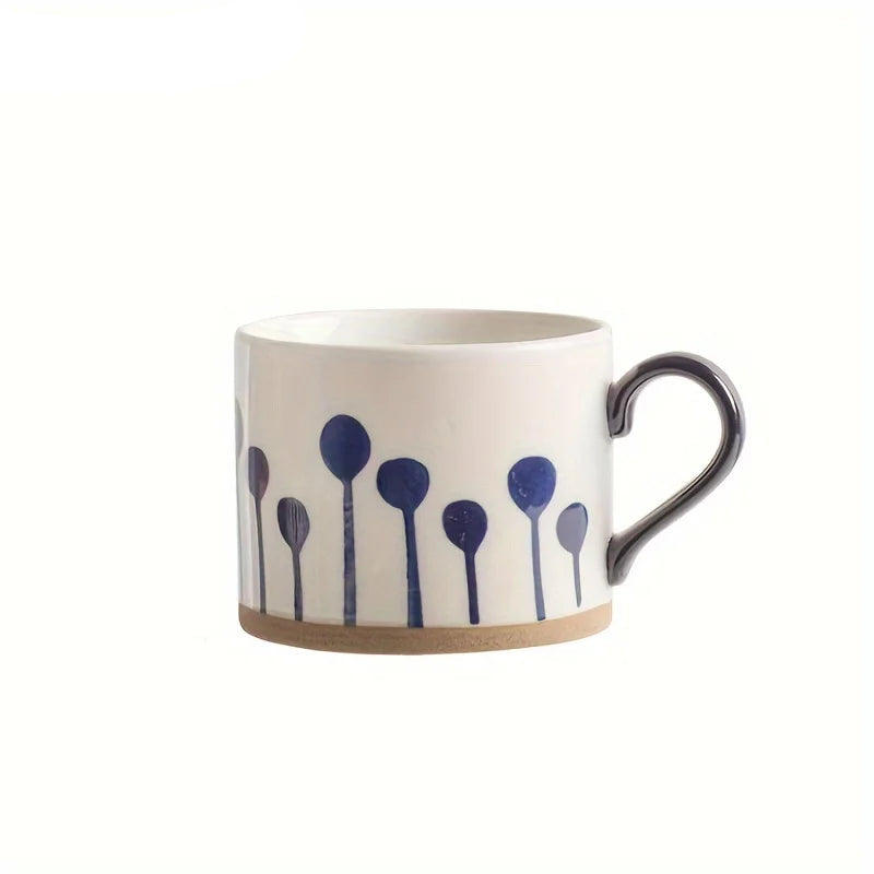 Vix Mug – 13oz cream ceramic mug with indigo-printed design, available in four unique styles, perfect for enjoying coffee, tea, or as a decorative piece.