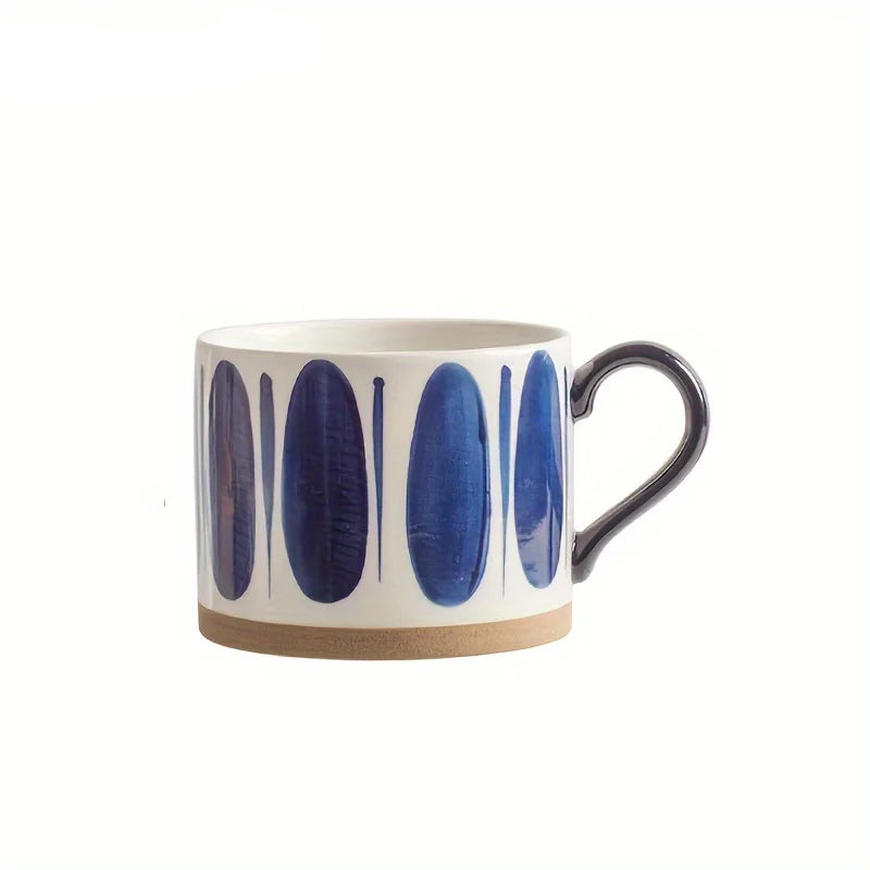 Vix Mug – 13oz cream ceramic mug with indigo-printed design, available in four unique styles, perfect for enjoying coffee, tea, or as a decorative piece.