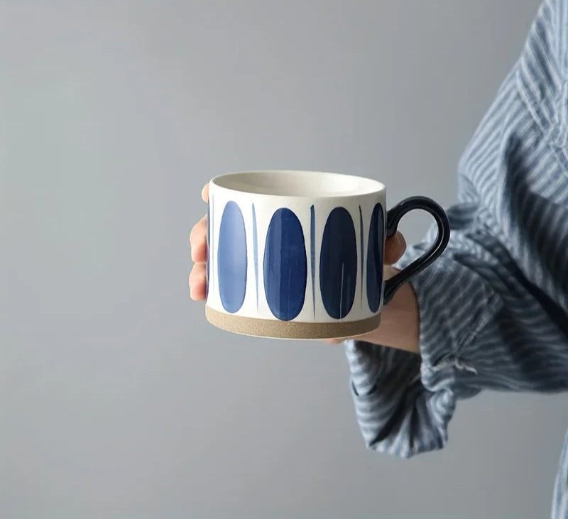 Vix Mug – 13oz cream ceramic mug with indigo-printed design, available in four unique styles, perfect for enjoying coffee, tea, or as a decorative piece.
