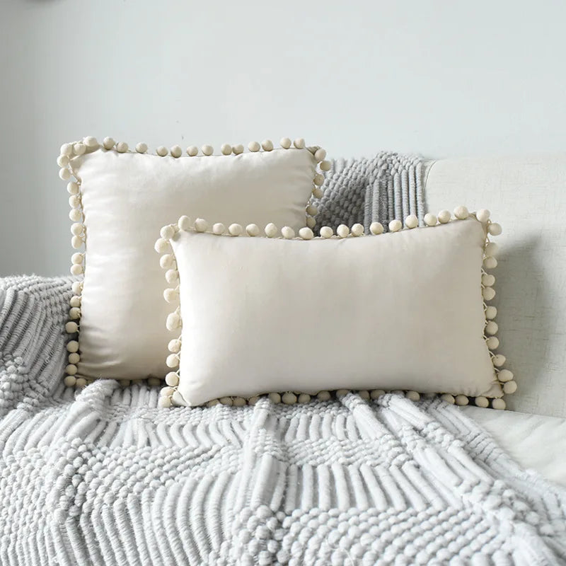 Yale Pillow Cover – luxurious velvet pillow cover with a small pom-pom border, available in multiple colors and sizes, adding a soft boho vibe to any room.