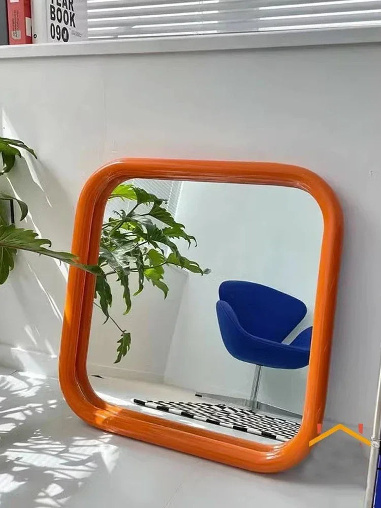 Uri Mirror – square mirror with rounded corners, vibrant colorways, and a retro-inspired design, available in small (60x60 cm) and large (80x80 cm) sizes.