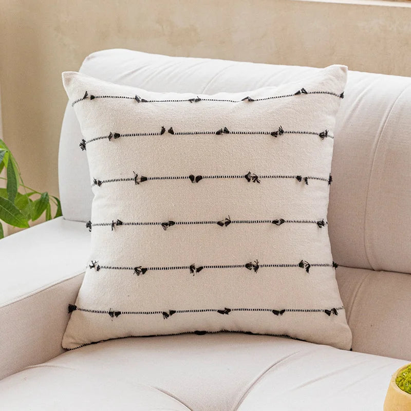 Elegant Irene Pillow Cover with cream neutral base and colored striped detailing, available in two sizes. Made from soft, high-quality cotton. Ideal for home decor enthusiasts, perfect for adding style to living rooms and bedrooms. Does not include filler.