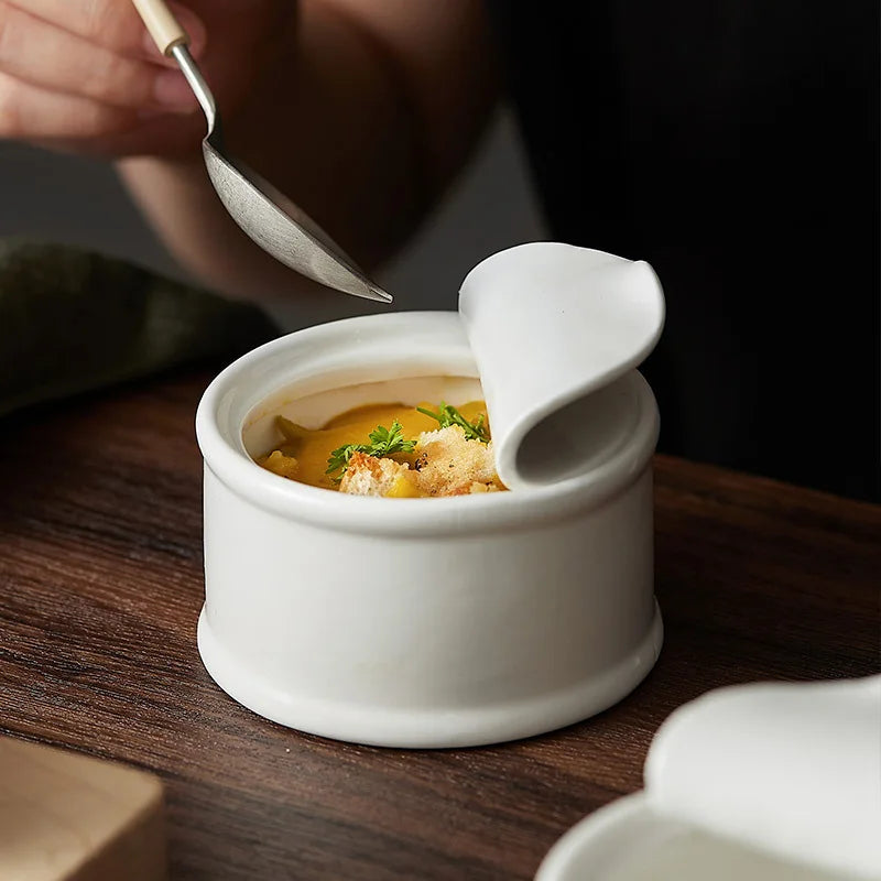 Clara Ramekin – small white ceramic ramekin with a unique tin can-inspired design, perfect for serving desserts, soups, or individual portions with playful elegance.