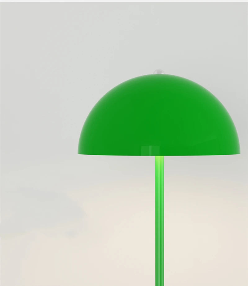 Image of the Tully Floor Lamp featuring a sleek, modern design with bright colorways. The lamp has a unique mushroom shape, made from durable metal, and includes an easy-to-use button switch. Perfect for home décor enthusiasts looking to add stylish accent lighting to their space.