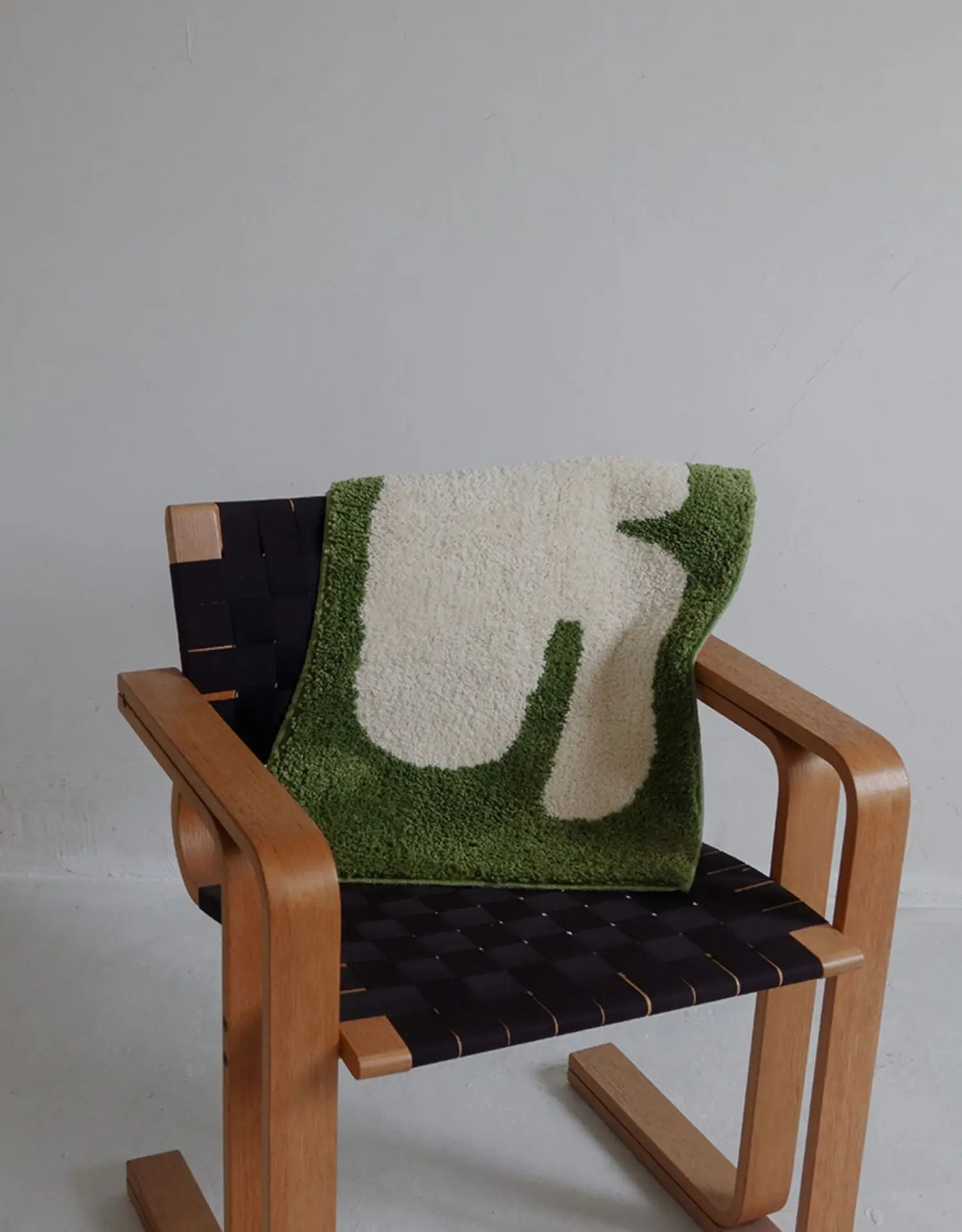 Oaklee Bath Mat featuring a plush, soft texture in various graphic styles and colors. Made from absorbent polyester with anti-slip backing, this minimalistic bath mat enhances bathroom décor while providing comfort and safety. Ideal for home décor enthusiasts seeking both style and functionality for their bathroom floor.
