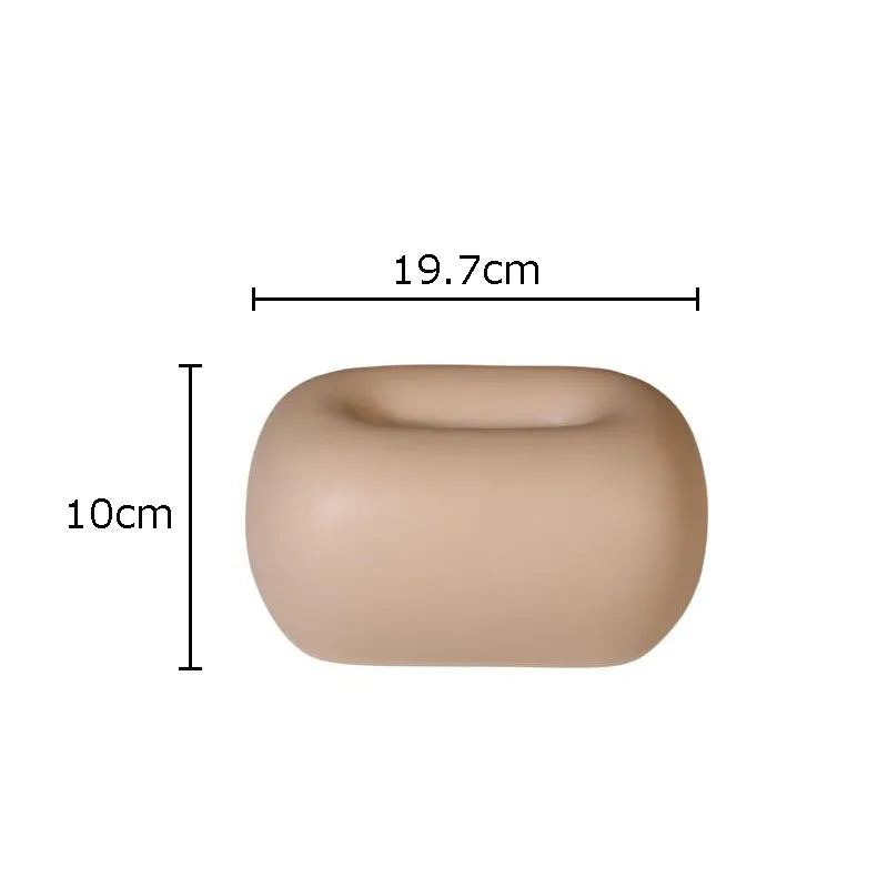 Rounded ceramic tissue box in a modern, minimalist design with four colorway options. A sleek and stylish home décor piece, perfect for living rooms, bedrooms, offices, or bathrooms.