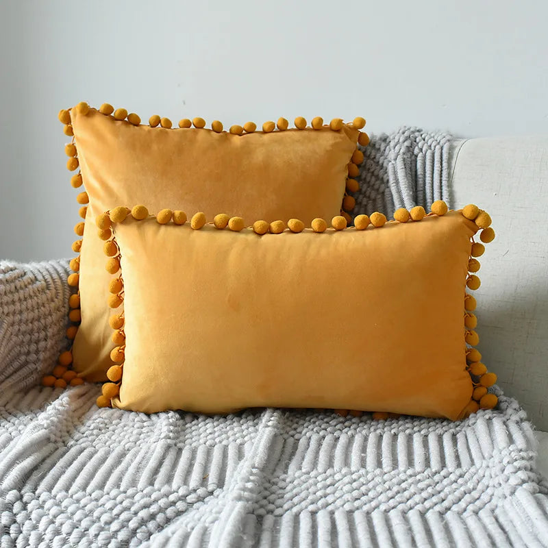 Yale Pillow Cover – luxurious velvet pillow cover with a small pom-pom border, available in multiple colors and sizes, adding a soft boho vibe to any room.