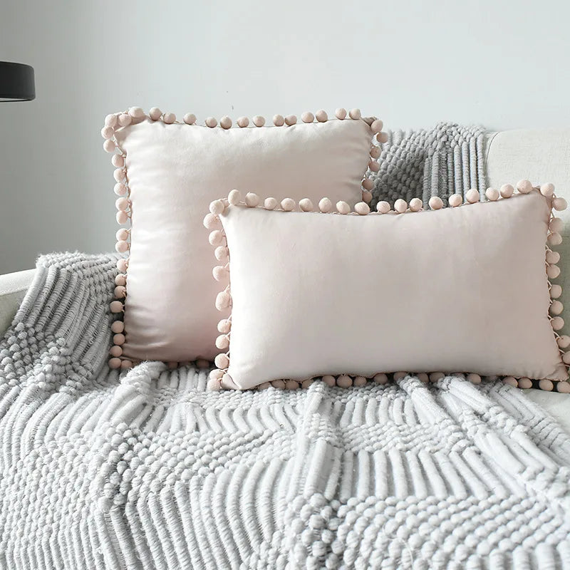 Yale Pillow Cover – luxurious velvet pillow cover with a small pom-pom border, available in multiple colors and sizes, adding a soft boho vibe to any room.