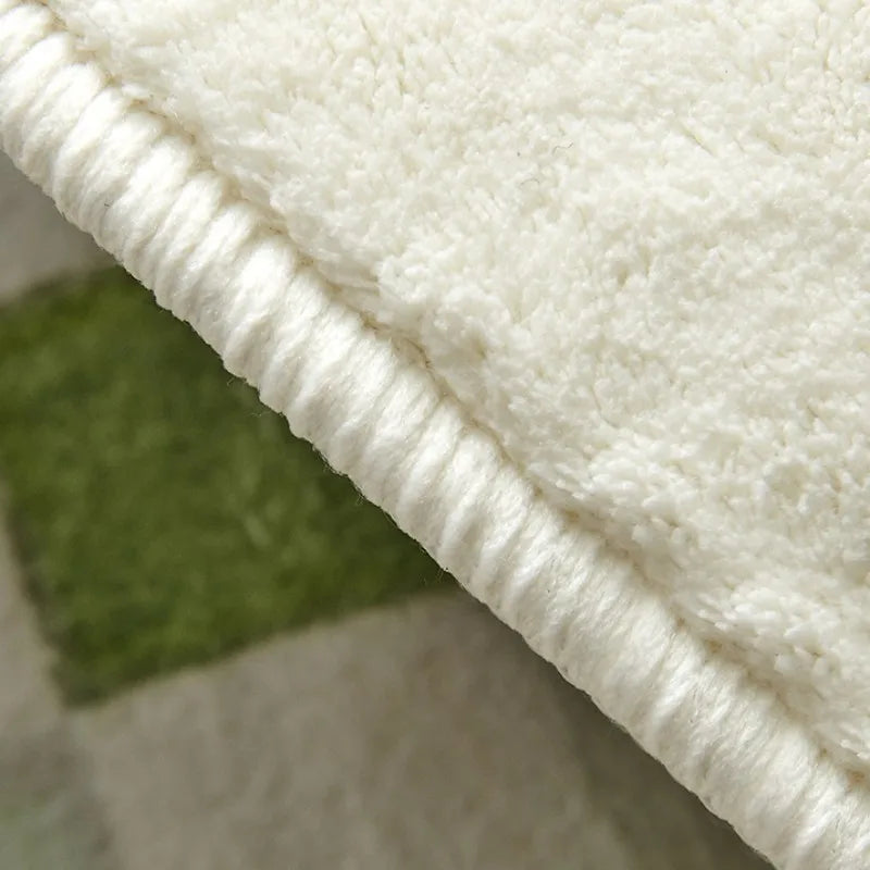 Modern plush area rug with scalloped edge, available in two colorways. Fluffy polyester with non-slip bottom - Domus Forge