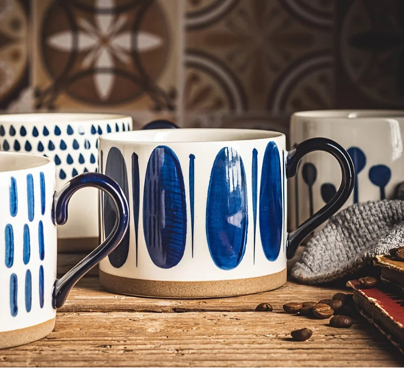Vix Mug – 13oz cream ceramic mug with indigo-printed design, available in four unique styles, perfect for enjoying coffee, tea, or as a decorative piece.