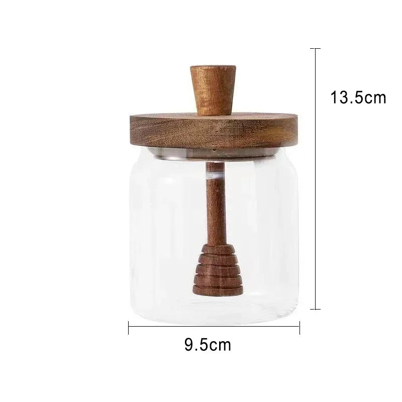 Fivel Honey Jar – elegant high borosilicate glass jar with a sealed storage design, wooden lid, and dip stick, perfect for keeping honey fresh and stylishly serving it.