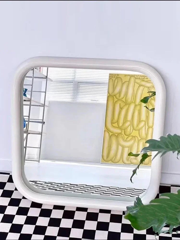 Uri Mirror – square mirror with rounded corners, vibrant colorways, and a retro-inspired design, available in small (60x60 cm) and large (80x80 cm) sizes.