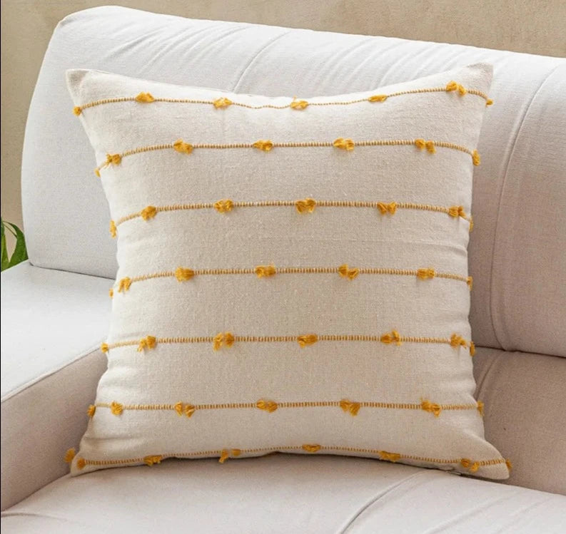 Elegant Irene Pillow Cover with cream neutral base and colored striped detailing, available in two sizes. Made from soft, high-quality cotton. Ideal for home decor enthusiasts, perfect for adding style to living rooms and bedrooms. Does not include filler.