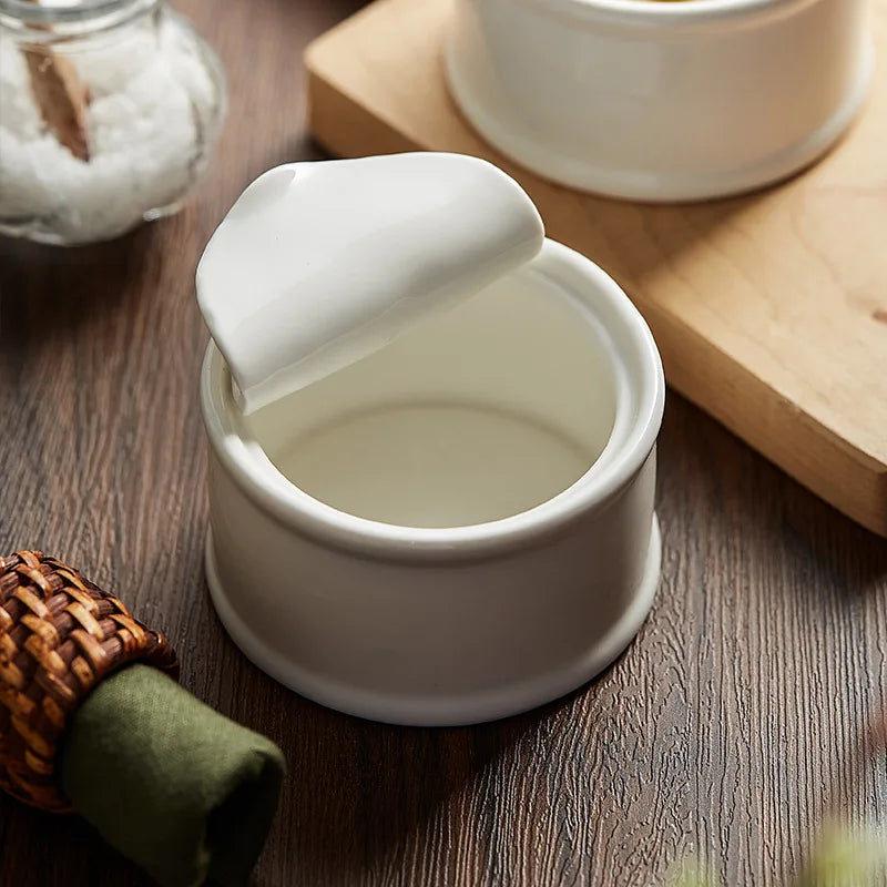 Clara Ramekin – small white ceramic ramekin with a unique tin can-inspired design, perfect for serving desserts, soups, or individual portions with playful elegance.