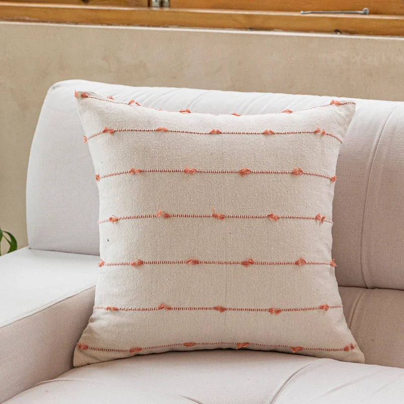 Elegant Irene Pillow Cover with cream neutral base and colored striped detailing, available in two sizes. Made from soft, high-quality cotton. Ideal for home decor enthusiasts, perfect for adding style to living rooms and bedrooms. Does not include filler.