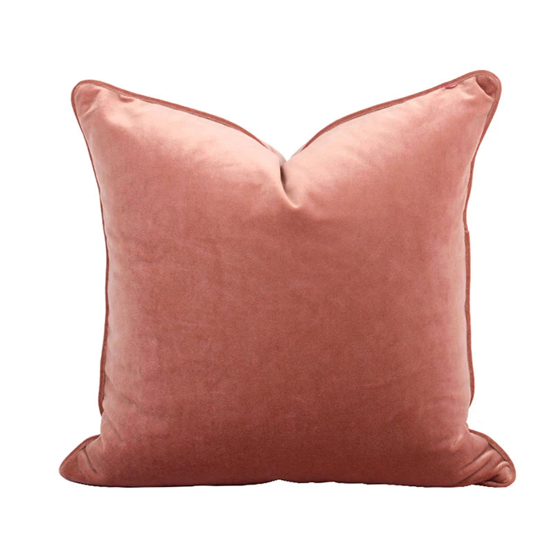 A collection of Bernadette Pillow Covers in various sizes and deep jewel tones, each crafted with a luxurious velvet feel. Made from 100% polyester, these pillow covers offer a rich and sophisticated look, perfect for home décor enthusiasts. Displayed on a sofa, the covers showcase their vibrant colorways and soft texture, ideal for adding elegance and comfort to any room. Pillow inserts are not included, allowing for customizable use and styling.