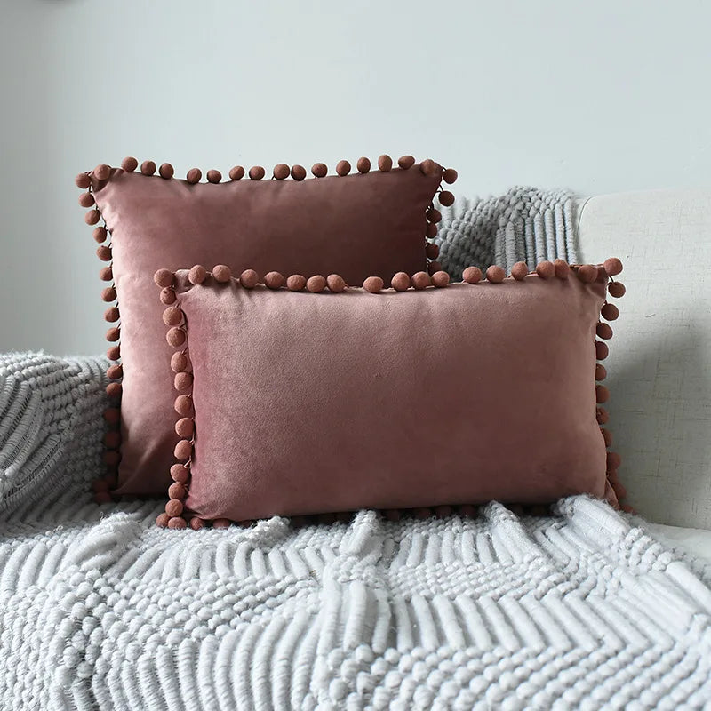 Yale Pillow Cover – luxurious velvet pillow cover with a small pom-pom border, available in multiple colors and sizes, adding a soft boho vibe to any room.