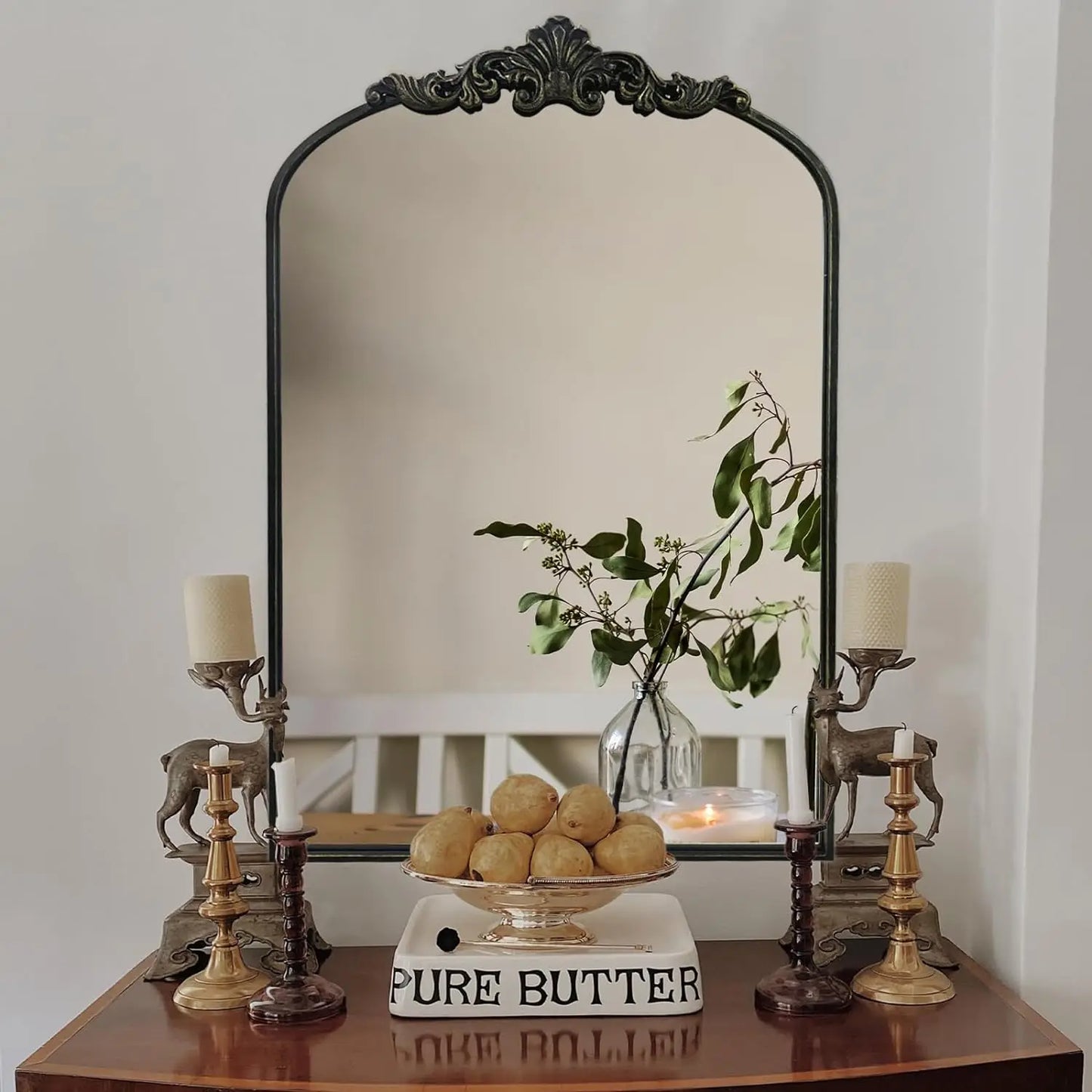 Addison Mirror featuring a vintage-inspired arched design with a sturdy black or brass iron frame. This elegant mirror is perfect for home décor enthusiasts, adding a touch of classic charm and sophistication to any room. Ideal for enhancing entryways, living rooms, or bedrooms, it serves both functional and decorative purposes.